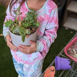 Gardening with kids helps them understand and connect with nature
